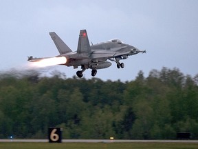 An RCAF CF-18 takes off from CFB Bagotville, Que. on Thursday, June 7, 2018. The Royal Canadian Air Force says two military officers have been handed reprimands and minor suspensions of pay for failing to enforce the military's orders on preventing and addressing sexual misconduct.