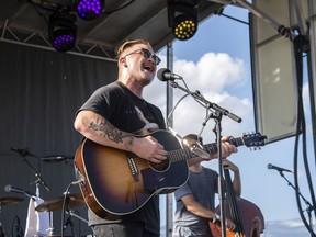 FILE - Zach Bryan performs at the Railbird Music Festival on Sunday, Aug. 29, 2021, in Lexington, Ky. The chorus against Ticketmaster's contentious concert pricing practices is growing, numbering among them Zach Bryan and friends. The country music artist dropped a live album, "All My Homies Hate Ticketmaster," on Sunday, Dec. 25, 2022. With it came a statement posted to social media in which he decried "a massive issue with fair ticket prices to live shows lately."