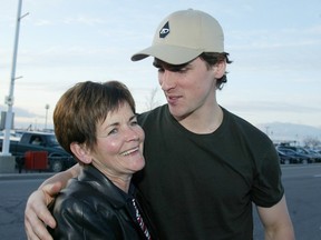 Files: Wade Redden meets his mom Patricia  (Pat) at the airport in Ottawa in 2003.