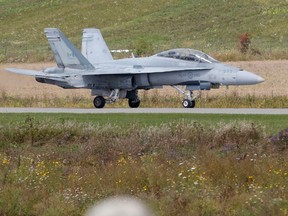 A CF-18 Hornet jet from the Royal Canadian Air Force taxis on a runway in Gatineau on the day before the start of the Aero Gatineau-Ottawa air show in September.