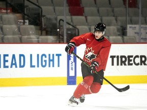 Olen Zellweger shoots during the Canada World Junior Hockey Championship selection camp in Moncton, N.B., Friday, December 9, 2022.