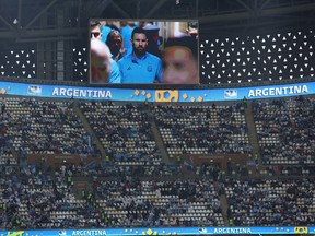 Soccer Football - FIFA World Cup Qatar 2022 - Final - Argentina v France - Lusail Stadium, Lusail, Qatar - December 18, 2022
Argentina's Lionel Messi is displayed on a big screen inside the stadium before the match