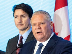 Prime Minister Justin Trudeau and Premier Doug Ford answer questions at CAMI after the Brightdrop electric van announcements in Ingersoll, Ont. 
Photograph taken on Monday December 5, 2022.