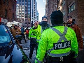 In the latter days of the occupation, Ottawa police officers were out in the "red-zone" as bylaw officers tried to issue parking tickets to protesters. For weeks, police had essentially stood by as the truckers partied downtown.