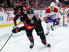 Ottawa Senators centre Ridly Greig (17) and Montreal Canadiens defenceman Justin Barron (52) during first period NHL action at the Canadian Tire Centre on Saturday, Jan. 28, 2023.
