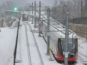 A train arcing in the snow Friday.
