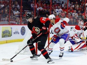 Ottawa Senators right wing Drake Batherson (19) controls the puck against Montreal Canadiens defenceman Johnathan Kovacevic (26) during third period NHL action at the Canadian Tire Centre on Saturday, Jan. 28, 2023.