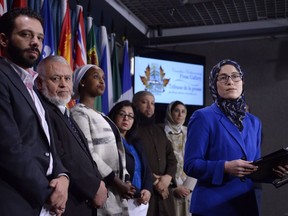 National Council of Canadian Muslims communications director Amira Elghawaby listens to a reporter's question as leaders of national and Quebec organizations joined the NCCM to call on governments to counter Islamophobia, racism and discrimination, on Parliament Hill on Wednesday, Feb. 8, 2017 in Ottawa. Prime Minister Justin Trudeau has announced the appointment of Elghawaby as Canada's first special representative to combat Islamophobia.THE CANADIAN PRESS/Justin Tang