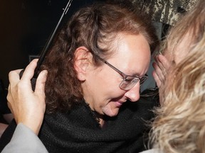 Kimberly Polman is greeted by family members after being released from custody in Chilliwack, B.C. in October. She was repatriated to Canada from a detention camp in Syria after marrying an ISIL fighter, and is free on bail.