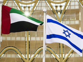 FILE -The Emirati and Israeli flags fly at Expo 2020 in Dubai, United Arab Emirates, when Israel struck an agreement to establish diplomatic ties with the United Arab Emirates.