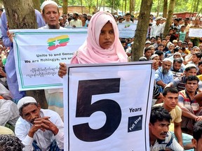 Rohingya refugees gather at the Kutupalong Refugee Camp to mark the fifth anniversary of their flight from neighbouring Myanmar to escape a military crackdown in 2017, in Cox's Bazar, Bangladesh, Aug. 25, 2022.