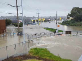 An area flooded during heavy rainfall is seen in Auckland, New Zealand Jan. 27, 2023, in this screen grab obtained from a social media video.