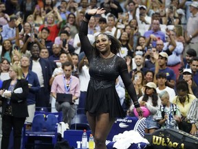 FILE - Serena Williams waves to fans after losing to Ajla Tomljanovic in the third round of the U.S. Open tennis championships, Friday, Sept. 2, 2022, in New York. The Australian Open will be the first Grand Slam tournament since Serena Williams walked away from tennis and played her farewell match in New York at the U.S. Open.