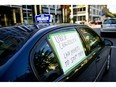 Cab drivers pictured in 2015 at City Hall to protest Uber.