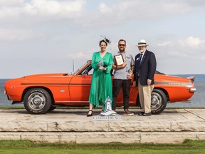 Timothy Schell (middle) won the 2022 Chief Judge's Choice award at the Cobble Beach Concours d'Elegance car show in Georgian Bay for his red 1969 Chevrolet Yenko Camaro. (Facebook)