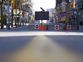 A traffic-free Wellington Street is pictured prior to the start of a demonstration, part of a convoy-style protest in Ottawa, Saturday, April 30, 2022. Ottawa Mayor Mark Sutcliffe says the city's transportation committee will vote on whether to extend the closure of Wellington Street next week. It has remained largely closed to traffic since last year's "Freedom Convoy" demonstration.
