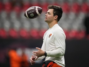 B.C. Lions quarterback Nathan Rourke tosses the football in the air before the CFL western semi-final football game against the Calgary Stampeders in Vancouver on Sunday, November 6, 2022.&ampnbsp;Rourke is about to become a Jacksonville Jaguar. The 24-year-old Victoria native tweeted Sunday that he plans to sign with the Jaguars, which were one of 12 teams Rourke worked out for after finishing the '22 season with the B.C. Lions.