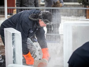 Given the frigid weather conditions in the capital, the Winterlude National Ice-Carving Championship on Sparks Street started a day later than originally planned.