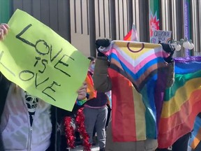 Outside the NAC on Wednesday, the number of Drag Story Time supporters swelled to about 200. They vastly outnumbered the few dozen people present to protest the story time event taking place inside the arts centre.