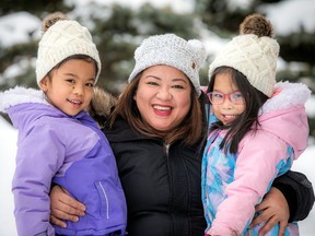 OTTAWA – Stephanie Manipol with her twin girls, six-year-old Emma (right) and sister Athena, Saturday, Jan. 28, 2023.ASHLEY FRASER/Postmedia