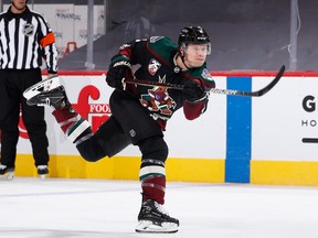 Jakob Chychrun of the Arizona Coyotes shoots to score a goal against the San Jose Sharks during the second period of the NHL game at Gila River Arena on January 16, 2021 in Glendale, Arizona.