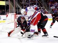 Frederik Andersen #31 of the Carolina Hurricanes makes a save against Julien Gauthier #12 of the New York Rangers during the first period of the game at PNC Arena on February 11, 2023 in Raleigh, North Carolina.