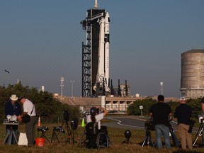 Photographers setup remote cameras to capture images of SpaceX Falcon 9 rocket and Dragon spacecraft Endeavour as it launches from pad 39A at the Kennedy Space Center on Feb. 26, 2023 in Cape Canaveral, Florida.  NASA's SpaceX Crew-6 mission is targeted to launch four astronauts to the International Space Station at 1:45 a.m. EST on Feb. 27, 2023.