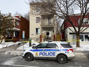 The Ottawa Police Service (OPS) Forensic Identification Section (FIS) investigate a residence at 209 York Street. Tuesday, Feb. 21, 2023