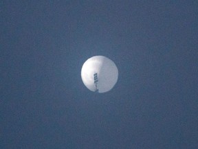 A suspected Chinese spy balloon is pictured in the sky over Billings, Mont., on Feb. 1.