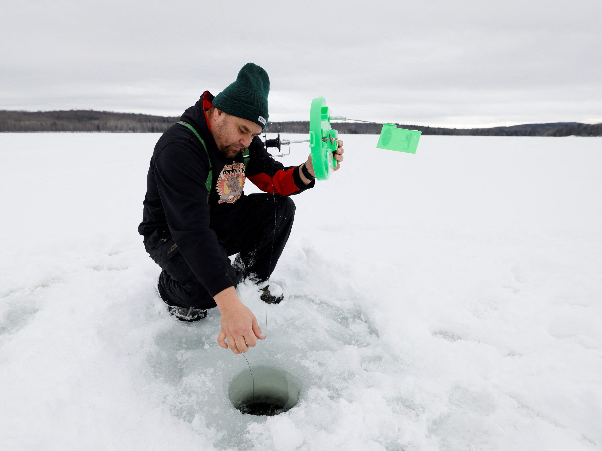 Warm Canadian winter threatens Algonquin icefishing traditions