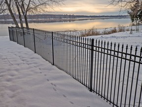 Iron fences are an excellent option to withstand extreme weather conditions, as wind passes right through them.  SUPPLIED PHOTOS