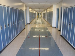 Holy Trinity High School in Ottawa Wednesday. Empty school classrooms and hallways.