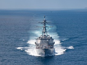 In this handout image from the U.S. Navy taken on Aug. 27, 2021, the destroyer USS Kidd transits the Taiwan Strait. Some worry the Americans will eventually be at war with China over Taiwan.
