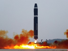 This picture taken on Feb. 18, 2023 and released from North Korea's official Korean Central News Agency (KCNA) on Feb. 19, 2023 shows test-firing of the intercontinental ballistic missile (ICBM) "Hwasong-15", at Pyongyang International Airport.