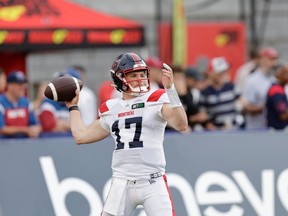 Alouettes quarterback Davis Alexander warms up before a game against the Winnipeg Blue Bombers at Molson Stadium in Montreal on Aug. 4, 2022.