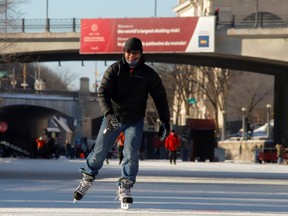 Memories from last year: A man skates on the Rideau Canal during a period of subzero Arctic weather on Jan. 14, 2022.