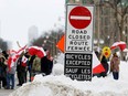 A small group of demonstrators gathered on Wellington Street recently to mark one year after the trucks blocked streets in protest against COVID-19 vaccine mandates.