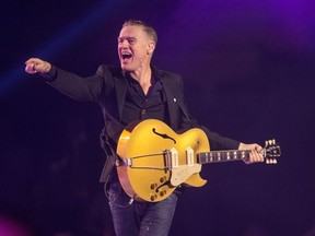 FILE - Bryan Adams performs during the Invictus Games closing ceremony in Toronto, on Sept. 30, 2017. Adams is nominated for a Grammy for best rock performance for "So Happy It Hurts."