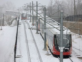 LRT trains sit near Lees Station after being immobilized by electrical issues with the system following an ice storm in early January.