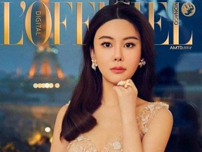 Hong Kong model Abby Choi shown on magazine cover. Choi's former father-in-law and his eldest son were charged with murder, while her former mother-in-law faces one count of perverting the course of justice, police said in a statement Sunday.
