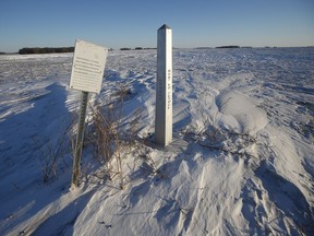 A border marker is shown just outside of Emerson, Man., Thursday, Jan. 20, 2022. A group of Republicans on Capitol Hill is turning its gaze towards Canada as it ramps up political criticism of President Joe Biden's immigration strategy.