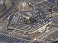 FILE - The Pentagon is seen from Air Force One as it flies over Washington, March 2, 2022. U.S. officials say an "unidentified object" has been shot down Sunday for the third time in as many days, this time over Lake Huron, after earlier downings in Alaska and Canada.