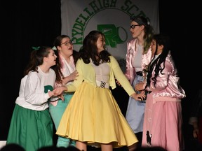 From left to right: Brynn Burchill performs as Patty, Megan Cram performs as Jan, Isabelle Strachan performs as Sandy Dumbrowski, Dayna Holbein performs as Marty and Madison Washington performs as Frenchy during Sir Wilfrid Laurier Secondary School's Cappies production of Grease, on March 2nd, 2023 in Ottawa, Ontario.