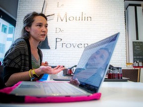 Maria Kartasheva, a representative of the Russian Canadian Democratic Alliance, organized an Ottawa group at Le Moulin De Provence downtown. to write letters to support political prisoners in Russia