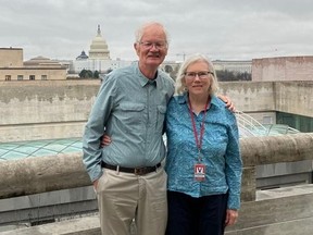 Mary Ellen Kot and husband Patrick Shaughnessy enjoy the view of Washington D.C. from the Canadian Embassy.