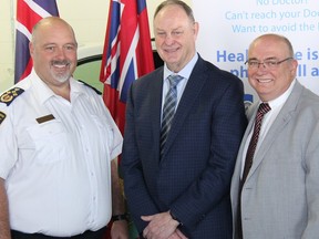 Renfrew-Nipissing-Pembroke MPP John Yakabuski (centre) announced permanent funding for the Renfrew County Virtual Triage and Assessment Centre on March 24. Paramedic Services Chief Michael Nolan is at left and Renfrew County Warden Peter Emon is at right.