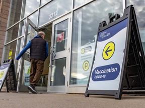 A man enters a COVID vaccination centre in Kirkland.