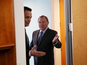 National Hockey League Commissioner Gary Bettman (R) met with Ottawa Mayor, Mark Sutcliffe at the Mayor's office, March 27, 2023.