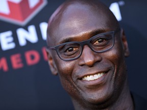 (FILES) In this file photo taken on August 20, 2019, US actor Lance Reddick arrives for the Los Angeles premiere of "Angel Has Fallen" at the Regency Village theatre in Westwood, California.