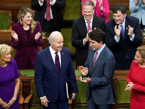U.S. President Joe Biden stands next to U.S. first lady Jill Biden, Prime Minister Justin Trudeau and his wife Sophie Gregoire, in the House of Commons in Ottawa, March 24, 2023.